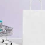 Social Media Ecommerce - Push Cart and a White Paperbag