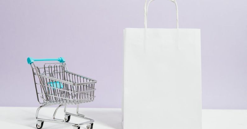 Social Media Ecommerce - Push Cart and a White Paperbag