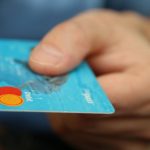 Ecommerce Analytics - Person Holding Debit Card