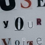 Campaign Influencer - Use Your Voice inscription on gray background