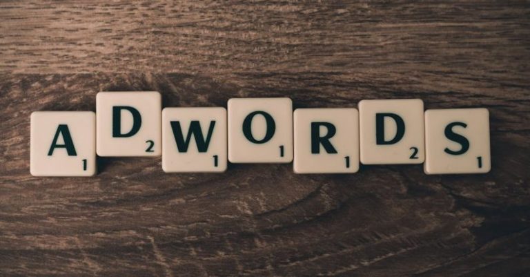 Google Adwords - Scrabble Forming Adwords on Brown Wooden Surface