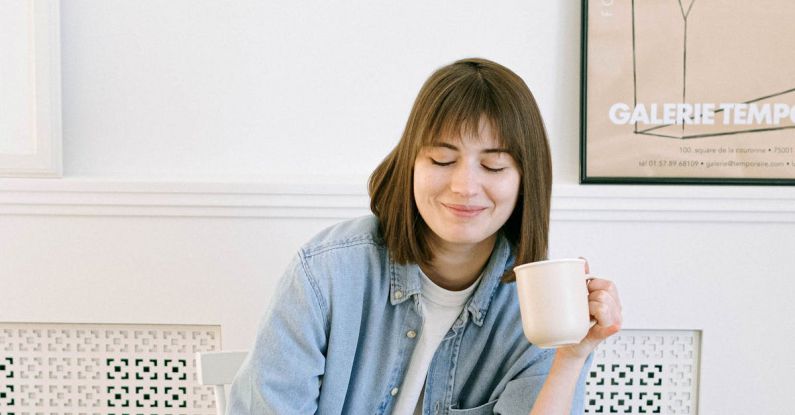 Segmentation Email - Woman Drinking Coffee and Looking at a Laptop