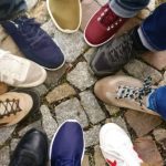 Brand Community - People Forming Round by Shoes